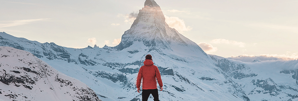 Person In Front of Snowy Mountain | Juern Technology