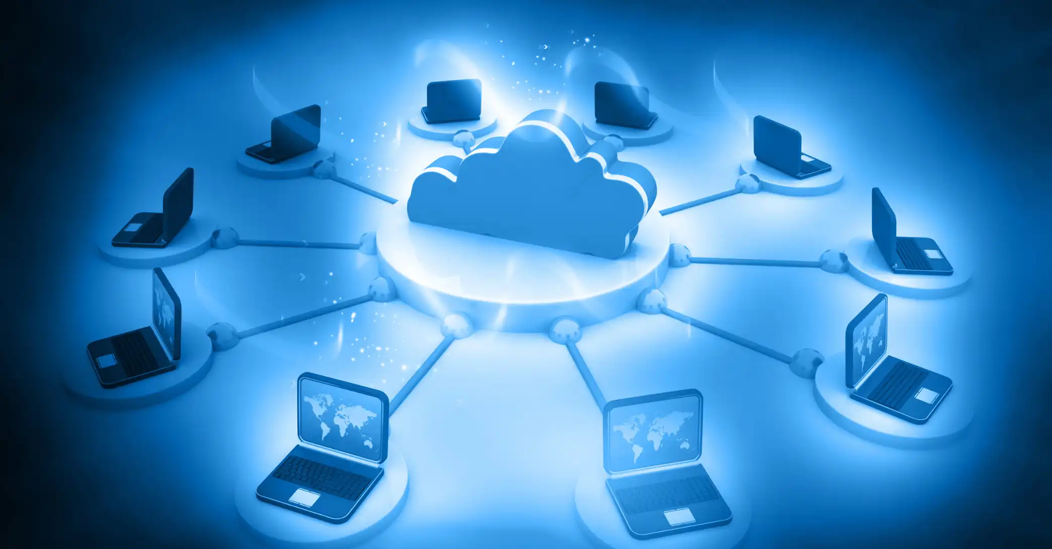 Laptops connected in circle to cloud