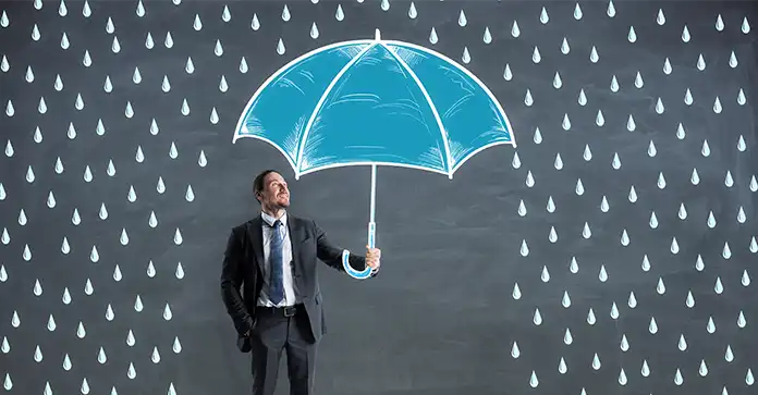 businessman with drawn rain and umbrella sketch denoting disaster protection